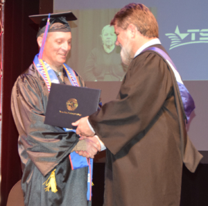 bill commencement 300x297 - Miley credits TSTC for helping him realize purpose