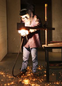 welder with sparks resized 215x300 - TSTC Welding Technology Program in Marshall Ready to Welcome Students This Fall
