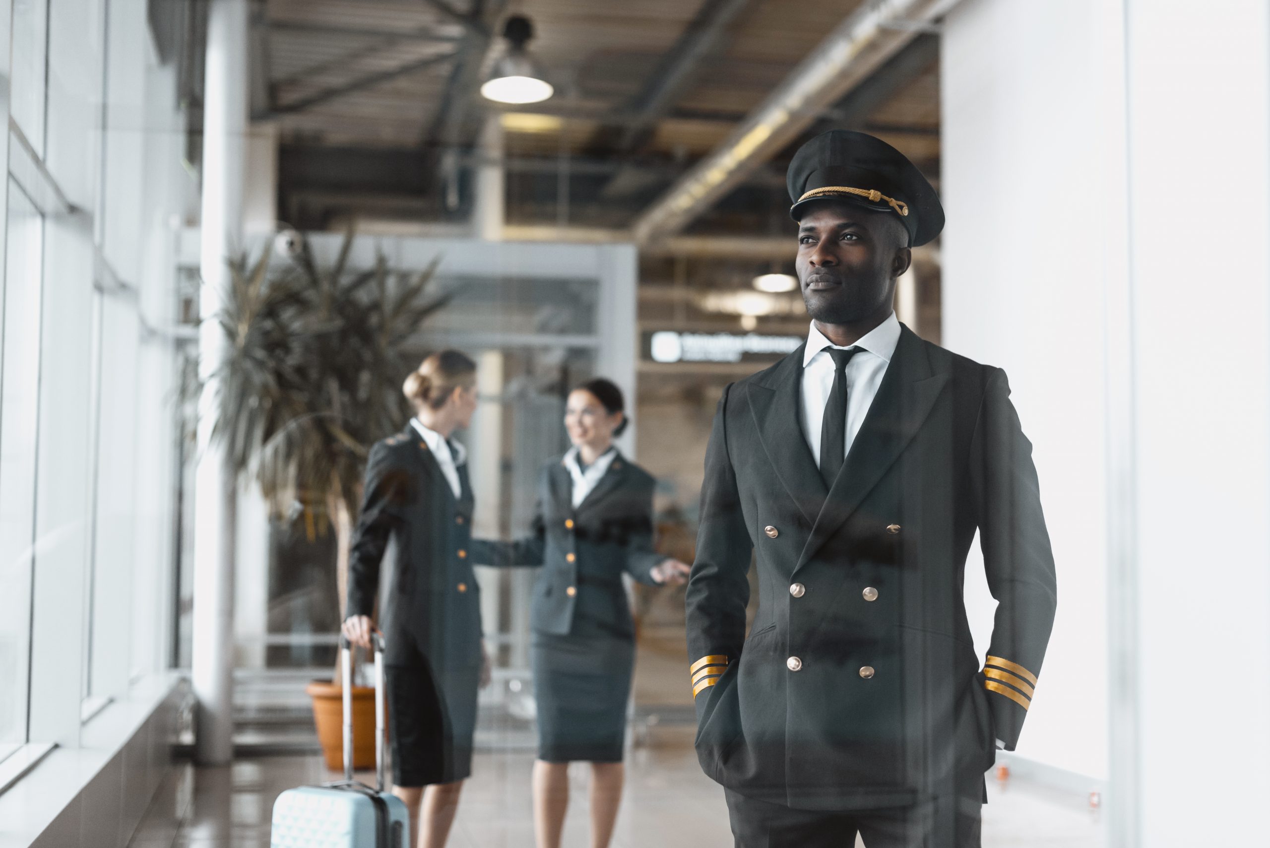 Black male pilot in suit