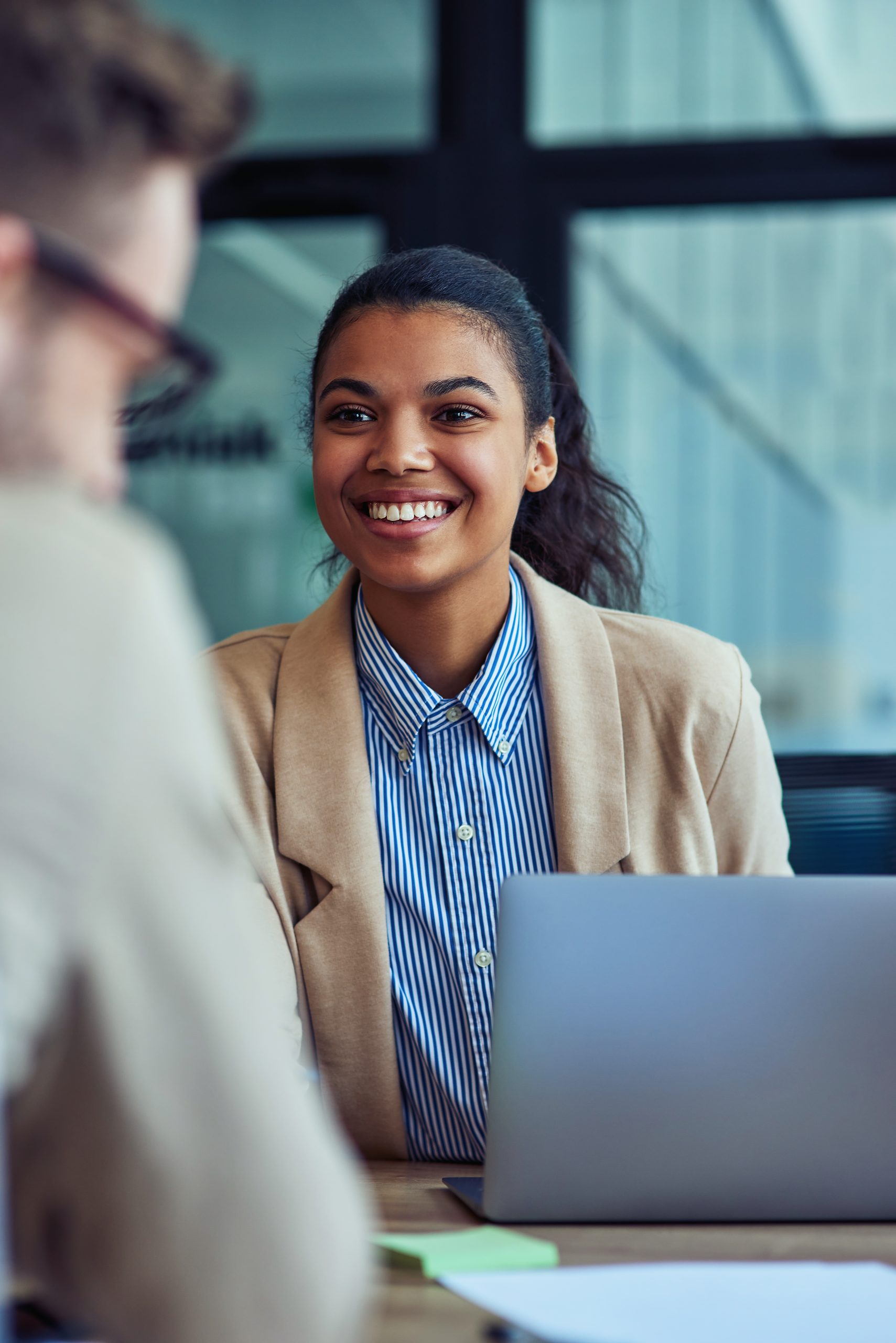 Black female at laptop with male caucasian