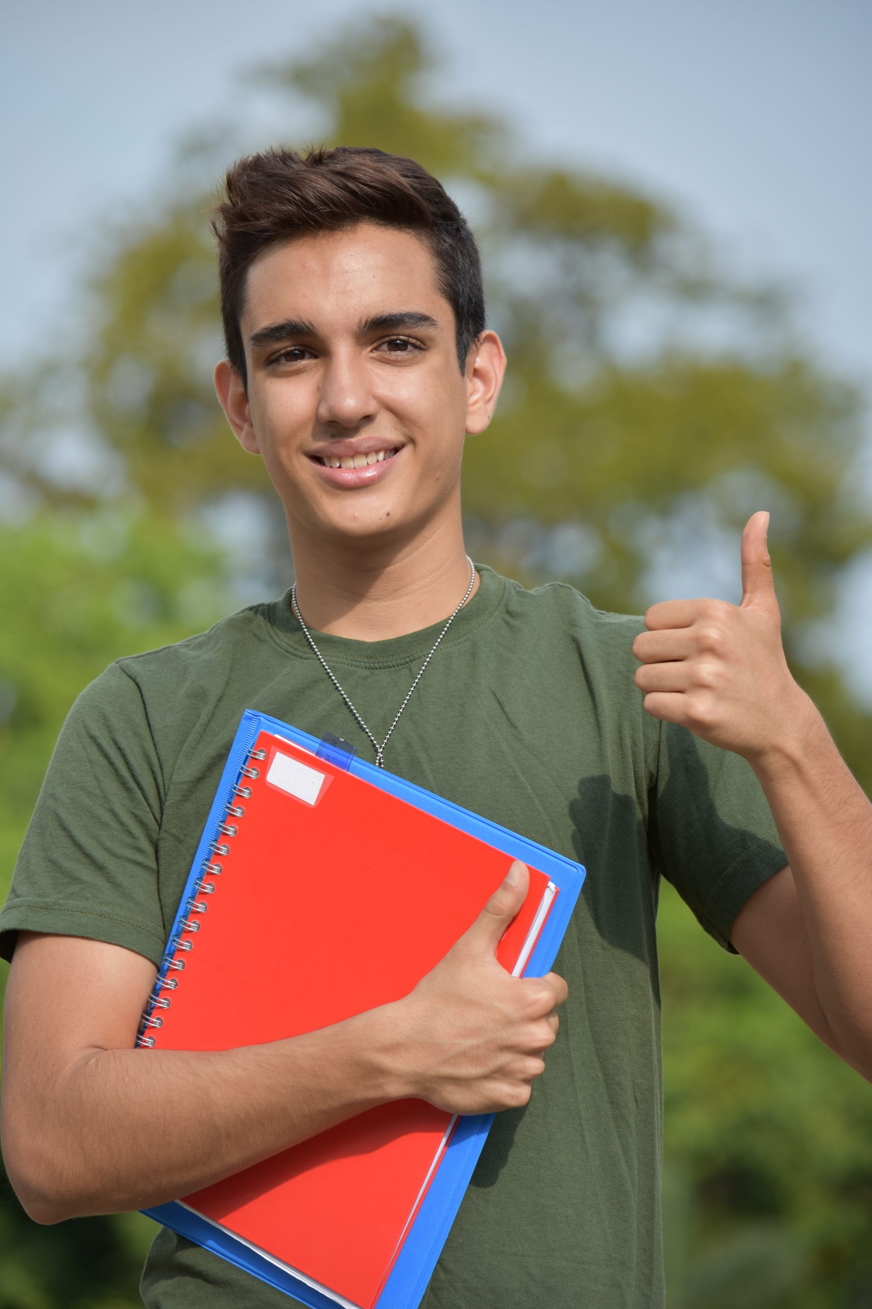 Hispanic male student with dogtags