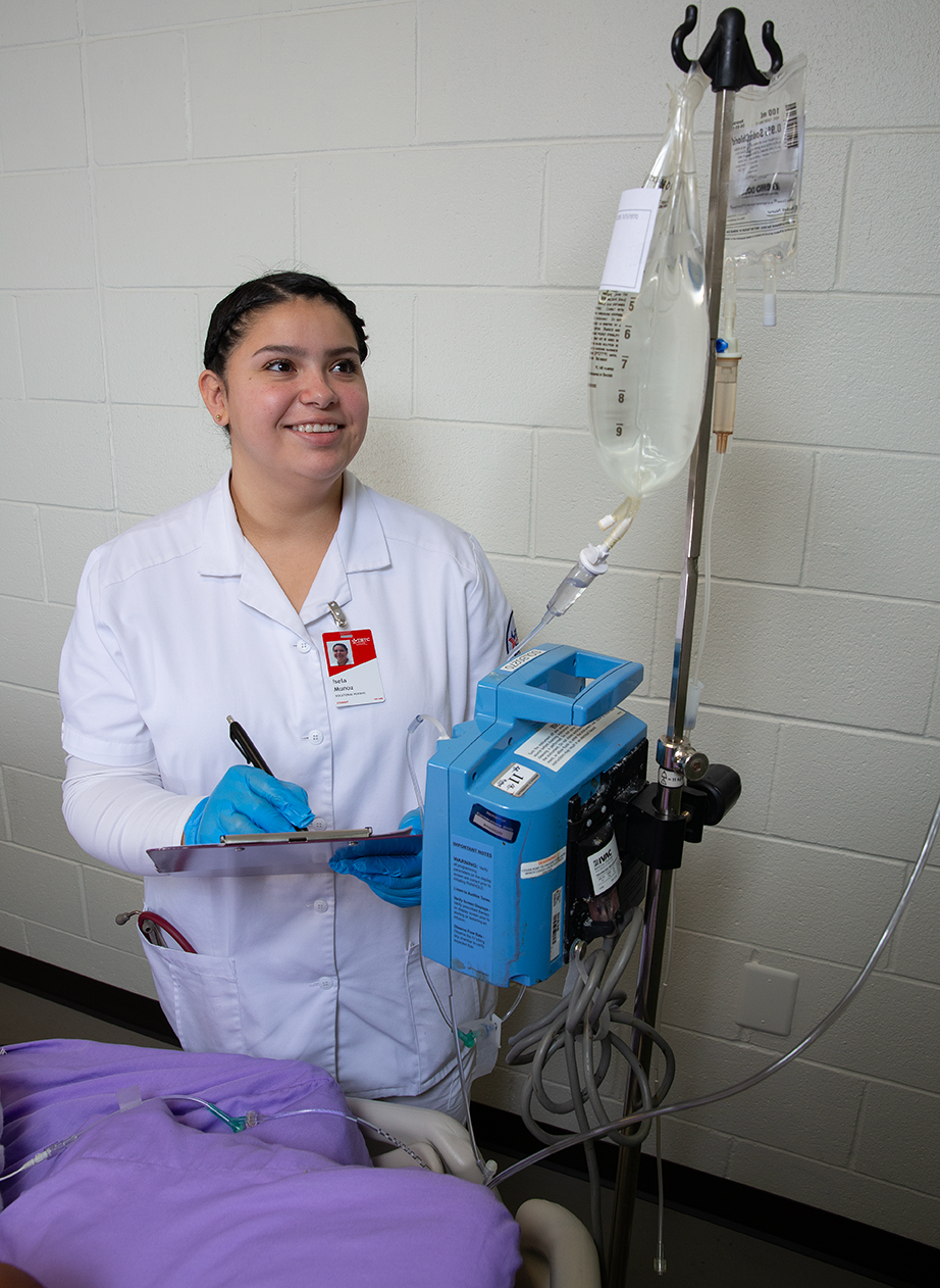 Harlingen nursing student practicing hands-on training in the simulation lab.