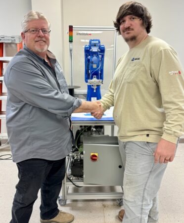 TSTC graduate Kris Guilliams (right) is an operations manager for North American Substation Services. He is shown shaking hands with one of his former TSTC instructors, Douglas Clark. (Photo courtesy of TSTC.)