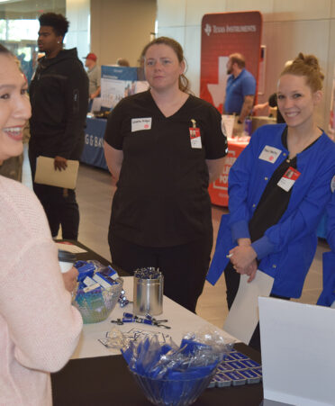 nursing students talking to a hospital representative