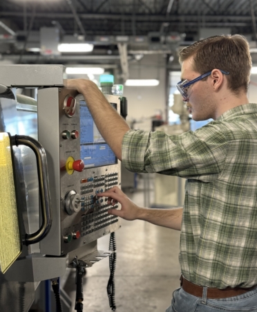 TSTC Precision Machining Technology student Aidan Parker operates a CNC machine during a recent lab session. (Photo courtesy of TSTC.)