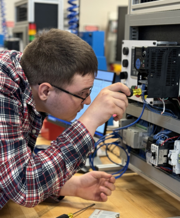 TSTC Industrial Systems student Austin West installs wiring during a recent lab session. (Photo courtesy of TSTC.)