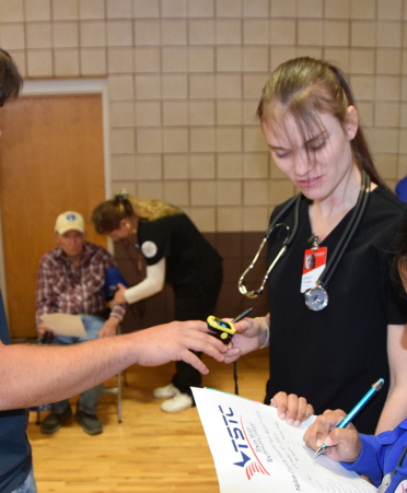 nursing students checking heart rate