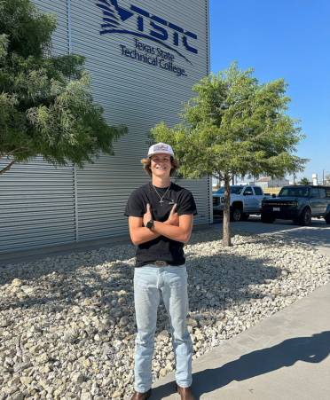 man standing outside of a building