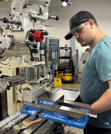 TSTC Precision Machining Technology student Kyler Smith operates a mill during a recent lab session. (Photo courtesy of TSTC.)