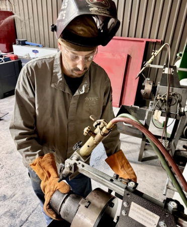 Welding Technology student Jason Clark practices pipe beveling during a recent lab session at TSTC. (Photo courtesy of TSTC.)