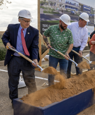 TSTC Chancellor and CEO Mike Reeser, left, and guests shovel dirt at the groundbreaking ceremony for the expansion of the Williamson County campus.