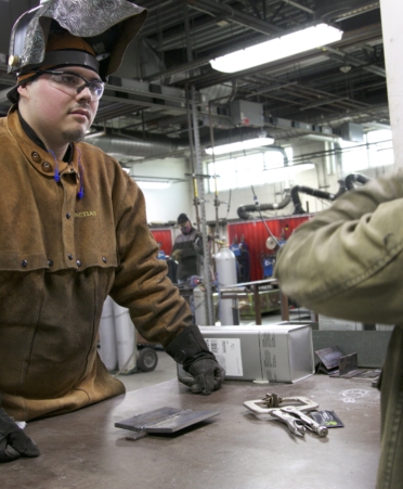 TSTC Welding Technology student Alfonso Juarez, left, receives feedback from an instructor during a recent lab session at TSTC’s Williamson County campus.